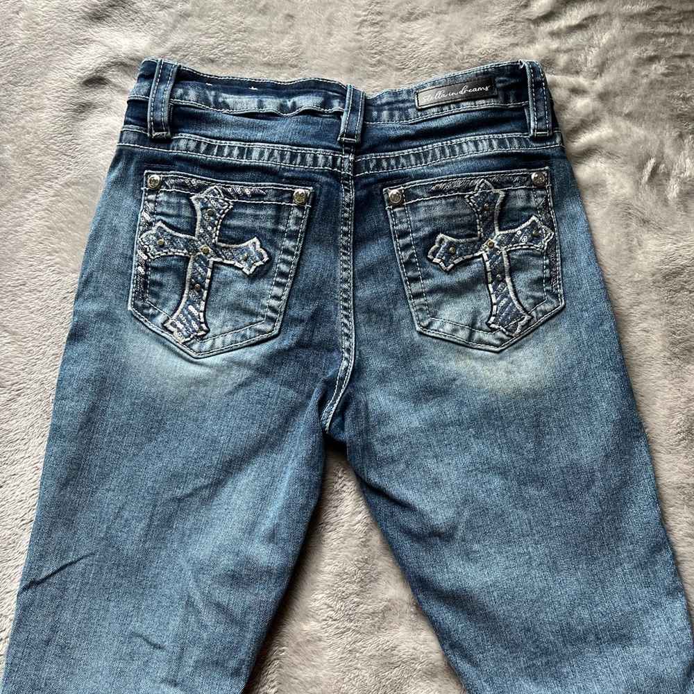 Blue Denim Low Rise Jeans with Cross Embroidery and Rhinestone Embellishments